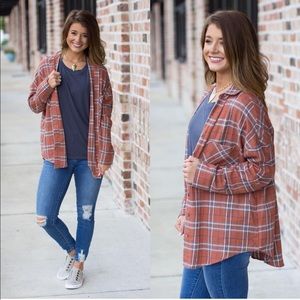 Orange plaid flannel button up from Bella Rose